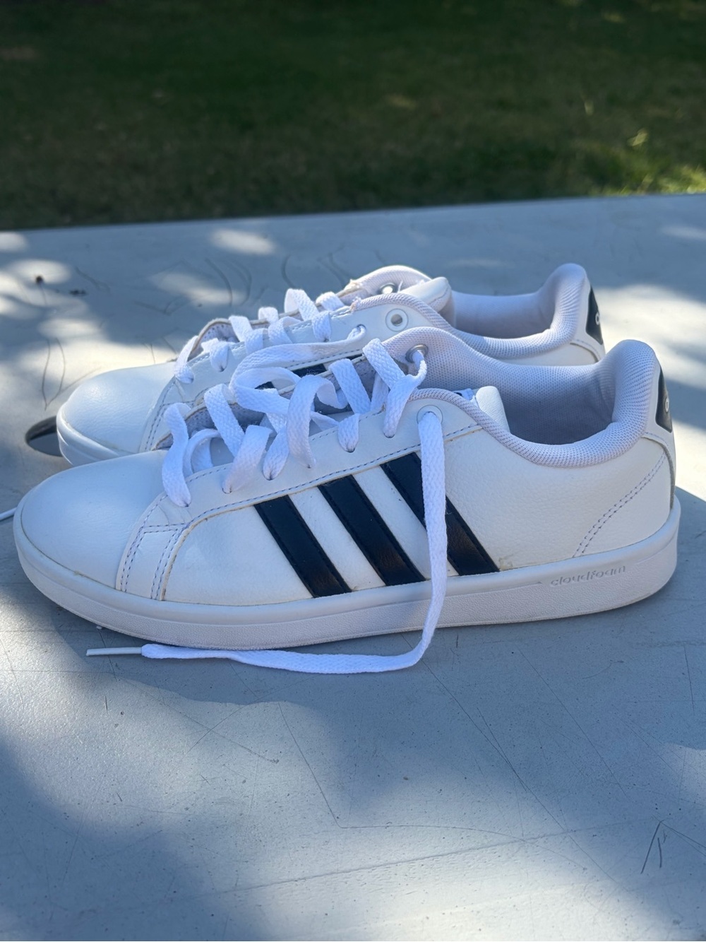 adidas White Sneakers with Black Three-Stripes Accent